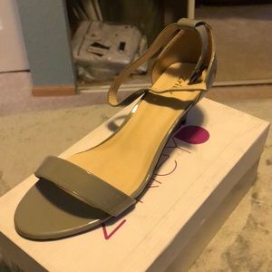 Z Riey’s low heeled grey open toed shoes